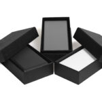 arrangement of empty boxes on white surface 2026 03 17 14 49 01 utc
