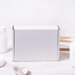 assortment of white cosmetic containers on wooden 2026 03 24 07 45 53 utc (1)