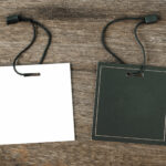 black and white tags on wood background 2026 03 18 13 50 19 utc