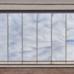 brick building facade featuring reflections of clo 2026 03 16 22 54 38 utc
