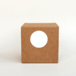 brown box with white circle on white background 2026 03 16 00 34 51 utc