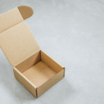brown cardboard box on gray textured background 2026 01 09 06 55 13 utc