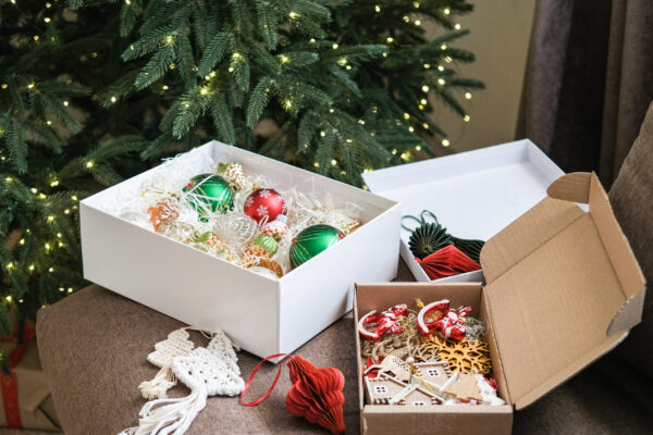 christmas ornaments in boxes with tree lights 2026 03 26 23 27 49 utc