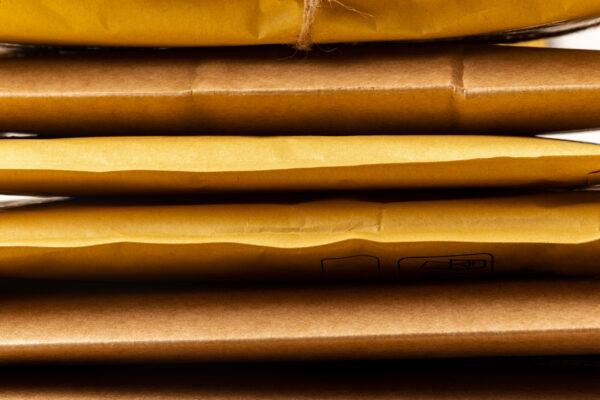close up shot of stack of padded mailing envelopes 2026 03 24 11 40 56 utc