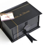 elegant black box of chocolate on white surface 2026 01 07 05 21 22 utc