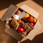 fresh food assortment in a box on brown surface 2026 03 18 08 16 02 utc