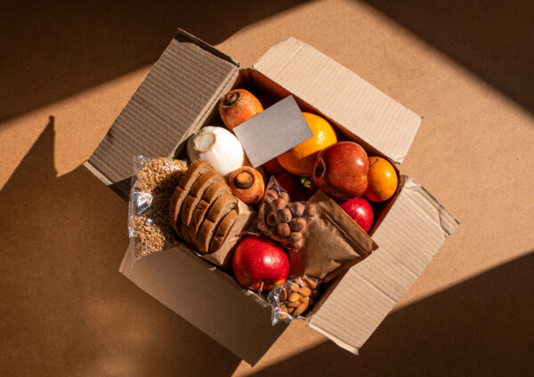 fresh food assortment in a box on brown surface 2026 03 18 08 16 02 utc