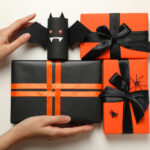 gift boxes paper bat and hands on white backgroun 2026 03 24 23 11 58 utc