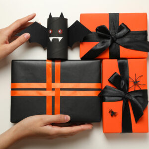gift boxes paper bat and hands on white backgroun 2026 03 24 23 11 58 utc