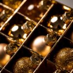 golden christmas ornaments in a box close up 2026 03 16 06 06 04 utc