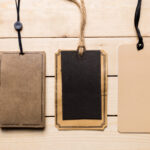 hanging tags for merchandise on wooden background 2026 03 09 02 56 18 utc