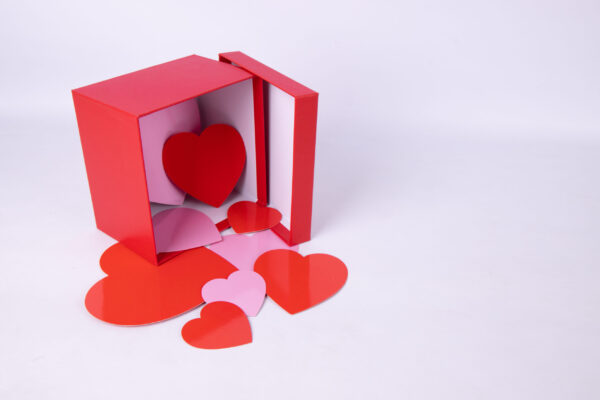 hearts spill from a red gift box 2026 04 15 05 02 54 utc