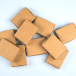 paper boxes on light background top view flat la 2026 01 08 22 13 19 utc