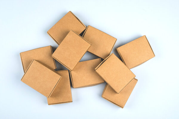 paper boxes on light background top view flat la 2026 01 08 22 13 19 utc