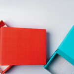 pile of colorful cardboard boxes on white backgrou 2026 03 09 01 52 30 utc