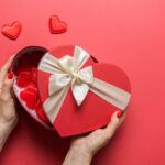 red heart shaped gift box with cream ribbon 2026 03 20 05 50 03 utc