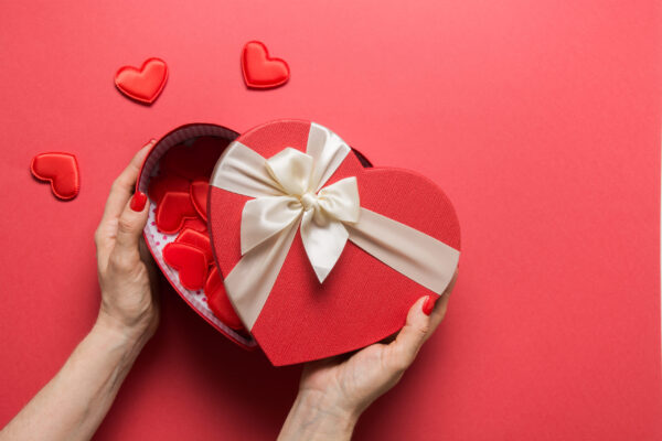 red heart shaped gift box with cream ribbon 2026 03 20 05 50 03 utc