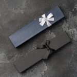 small jewelry box on gray background close up 2026 03 19 08 15 42 utc
