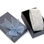 sparkling bracelet in gift box on white surface 2026 03 26 08 00 34 utc