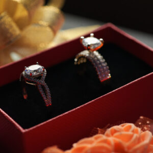 sparkling diamond rings displayed in red gift box 2026 03 24 08 59 39 utc