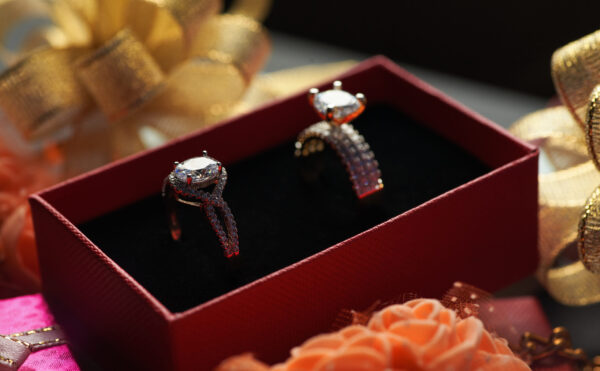 sparkling diamond rings displayed in red gift box 2026 03 24 08 59 39 utc