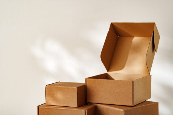 stack of brown cardboard boxes on white background 2026 03 19 09 08 45 utc