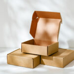 stacked cardboard boxes with open lid on top 2026 03 24 11 43 26 utc