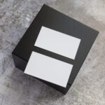 two blank cards on black box background 2026 03 17 19 58 12 utc