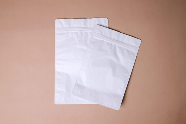two blank white pouches on neutral background 2026 03 24 03 36 24 utc
