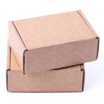 two brown cardboard boxes stacked on white backgro 2026 03 25 02 59 34 utc