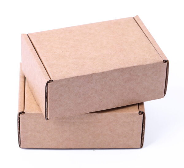 two brown cardboard boxes stacked on white backgro 2026 03 25 02 59 34 utc