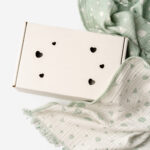 white gift box with sage green textile 2026 03 19 04 28 18 utc