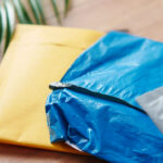 yellow blue and white shipping envelopes on surf 2026 03 16 03 24 37 utc