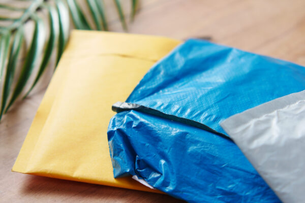 yellow blue and white shipping envelopes on surf 2026 03 16 03 24 37 utc