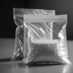 two clear bags filled with white powder 2026 03 18 08 04 54 utc