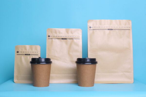 coffee cups and packaging against a blue backgroun 2026 03 18 04 23 04 utc