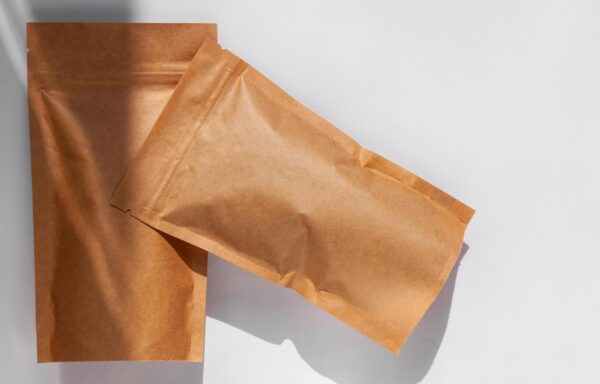 two brown paper pouches on white surface 2026 03 17 00 07 49 utc